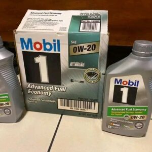 "Mobil 1 Engine Oil bottle showcasing premium synthetic formula. Close-up of Mobil 1 Engine Oil highlighting its advanced technology.