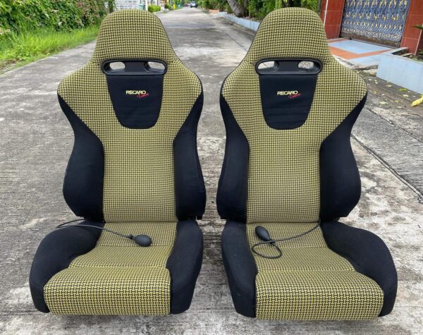 X2 Recaro SP-J Seats in vibrant Tomcat yellow fabric Close-up of reclining mechanism on Recaro SP-J seat