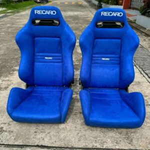 Original Recaro SR3 Seats recovered in blue fabric Close-up of ergonomic design on Recaro SR3 seat Installation of Recaro SR3 seats in a performance vehicle