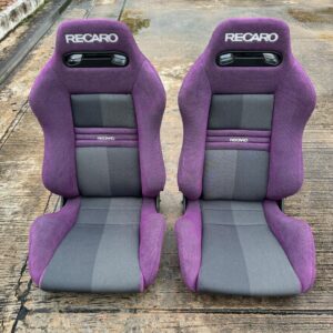 Original Recaro SR3 Seat showcasing ergonomic design and premium upholstery Close-up of Recaro SR3 Seat highlighting high side bolsters for lateral support.