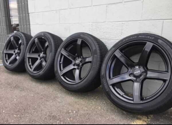 Close-up of OEM wheels for Dodge Charger Performance upgrade with 20x11 wheels and Pirelli tires