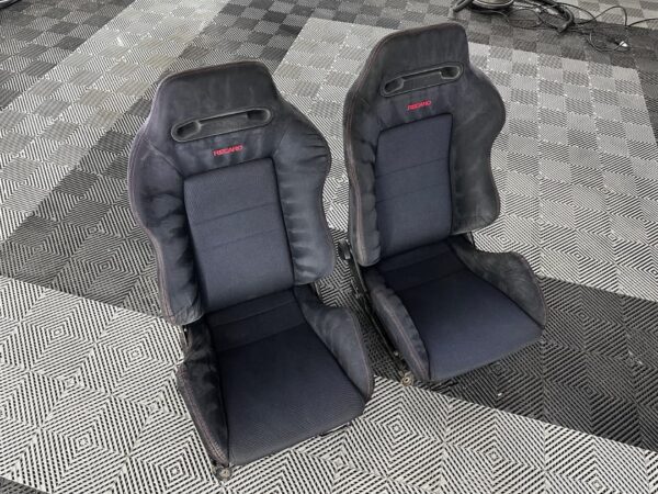 Black fabric upholstery of DC2R Recaro seats